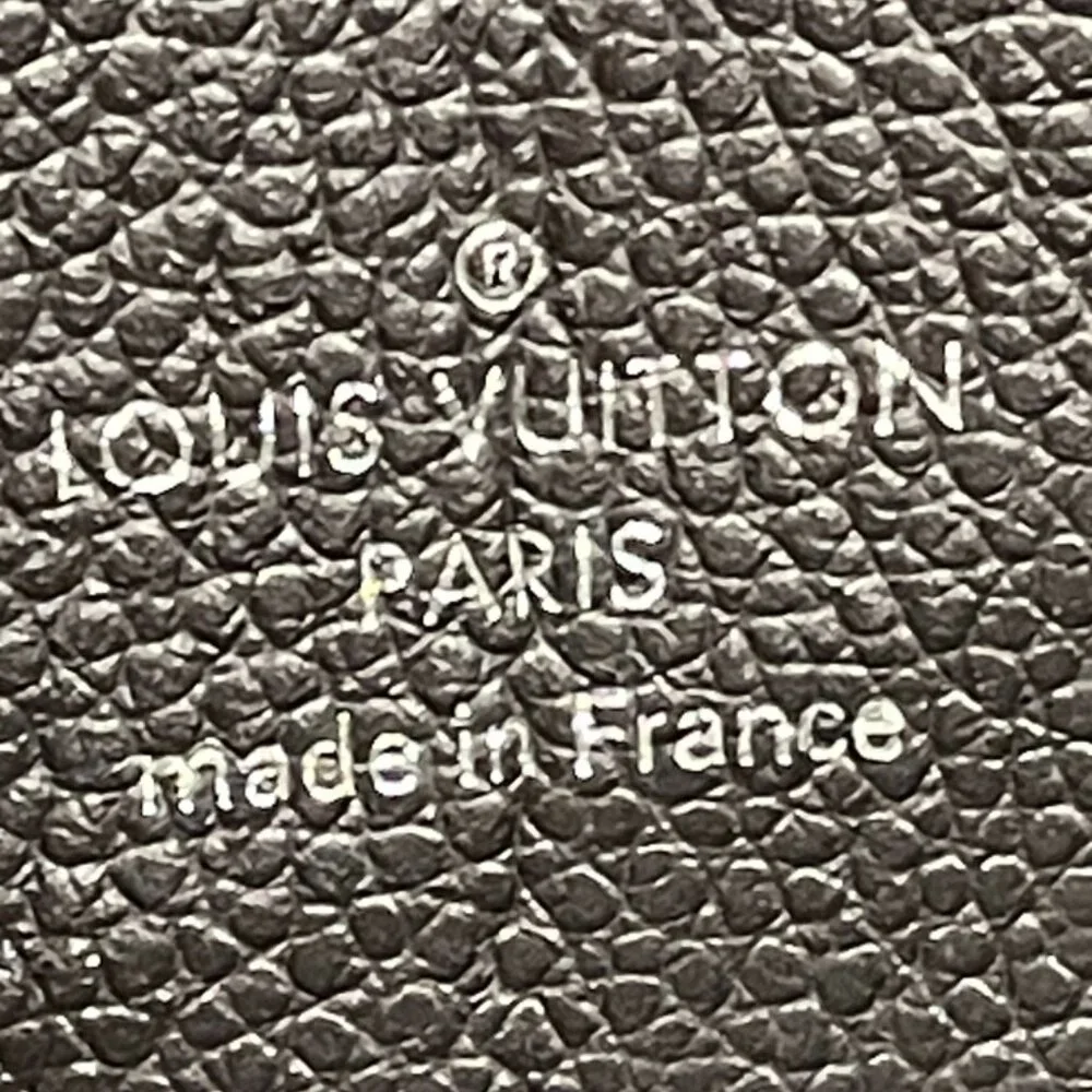 Louis Vuitton Zippy Wallet Monogram Empreinte Leather with Silver Studs (JB1040)